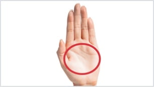 Paume ouverte. Petit cercle dessiné au-dessus d'une paume de main.