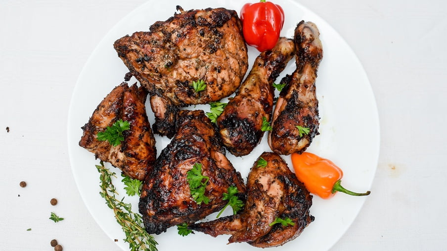 Cooked chicken on a platter. Cooked chicken on a platter.