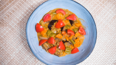 Creamy eggplant curry in a bowl ready to be eaten. Creamy eggplant curry in a bowl ready to be eaten.
