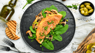 Frittata served on top of colourful greens. Frittata served on top of colourful greens.