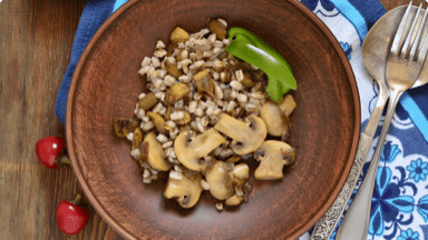 Cooked farro and mushrooms in a savoury salad. Cooked farro and mushrooms in a savoury salad.