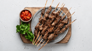 Cooked lamb on skewers ready to be eaten. Cooked lamb on skewers ready to be eaten.
