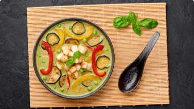 Colourful tofu stew with vegetables ready to be eaten in a bowl. Colourful tofu stew with vegetables ready to be eaten in a bowl.