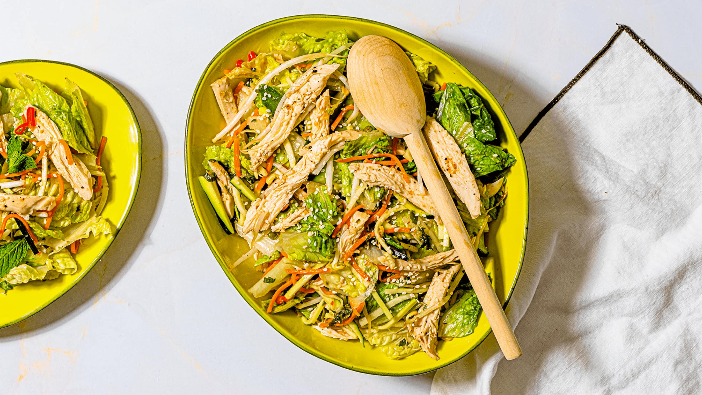 Vietnamese chicken salad in a bowl ready to be served and eaten. Vietnamese chicken salad in a bowl ready to be served and eaten.
