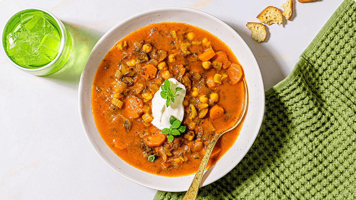 Colourful Moroccan harira soup with chickpeas in a bowl ready to be eaten. Colourful Moroccan harira soup with chickpeas in a bowl ready to be eaten.