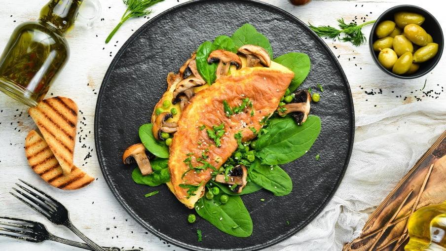 Frittata on a bed of greens.
