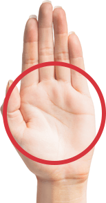 Paume de main tournée vers le bas avec grand cercle dessiné au-dessus de la partie plate de la main